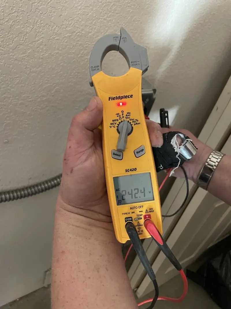 Voltage testing with clamp meter during Hot Tub / Pool Electrical Wiring in Bridgton
